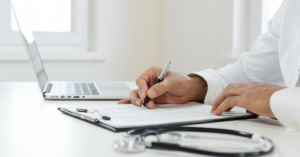 Doctor writing